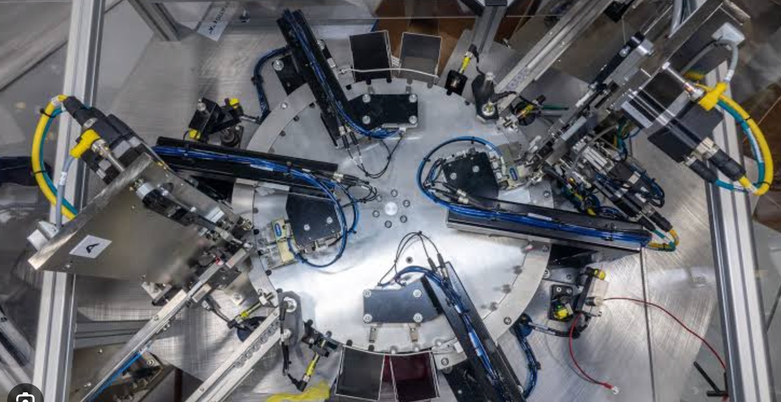 Rotary indexing automation cell with pneumatic actuators